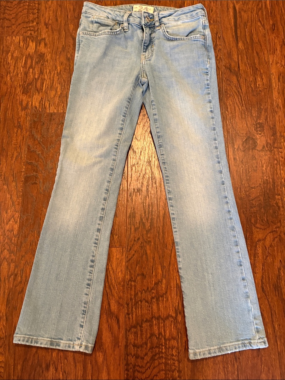 We The Free light wash straight leg jeans